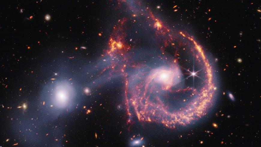 James Webb Space Telescope witnesses a 'smiling' galactic collision (images) --[Reported by Umva mag]