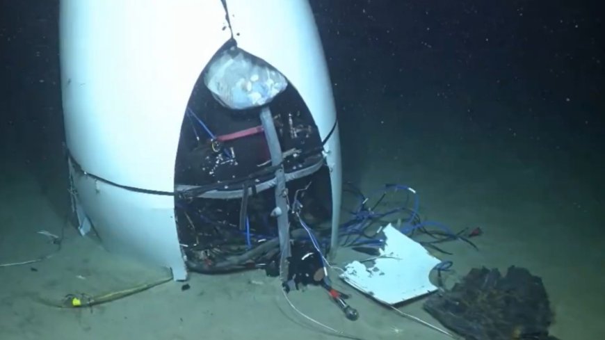 Chilling first video of doomed Titan submarine wreck shows mangled craft on ocean floor after devastating implosion --[Reported by Umva mag]