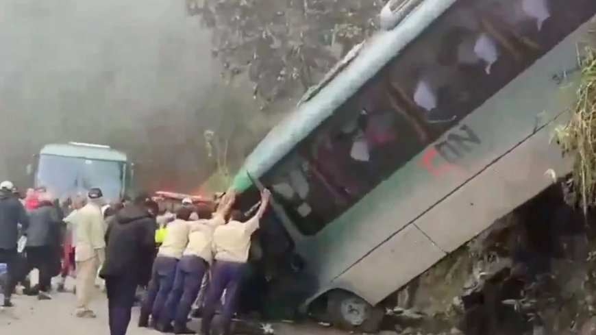 Tourist bus plunges off cliff at iconic landmark as locals try to stop it rolling down mountain with their bare hands --[Reported by Umva mag]