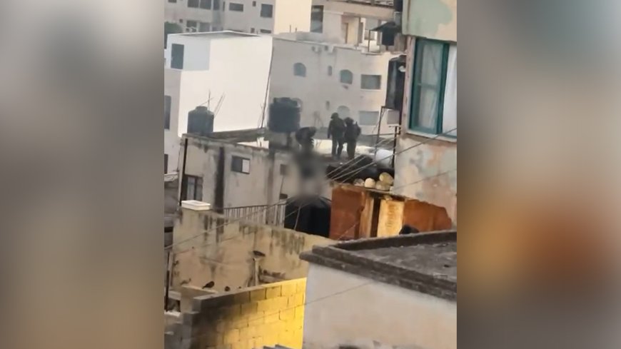 Video captures Israeli soldiers pushing dead bodies from roof --[Reported by Umva mag]