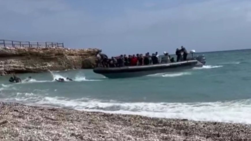 Brit tourists ‘traumatised’ as vid shows migrants land at Spanish beach before running past holidaymakers’ sunbeds --[Reported by Umva mag]