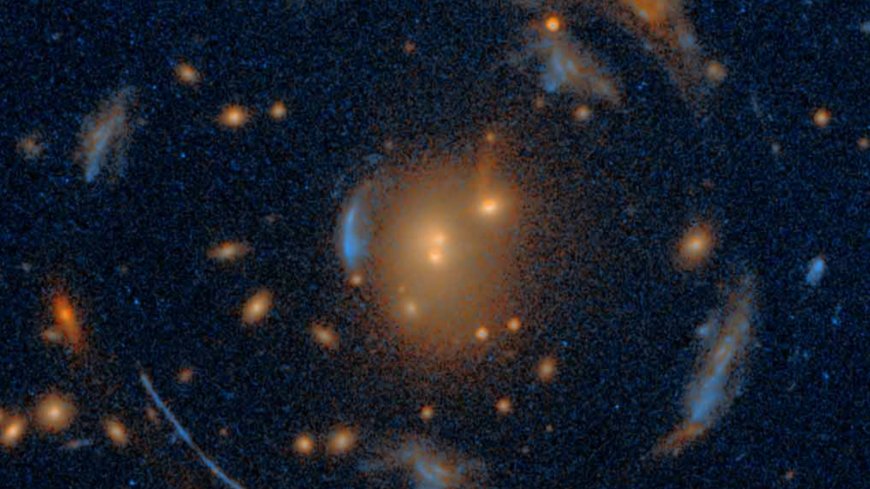 The largest Einstein Cross ever discovered dwells among a rare 'carousel' of galaxies --[Reported by Umva mag]