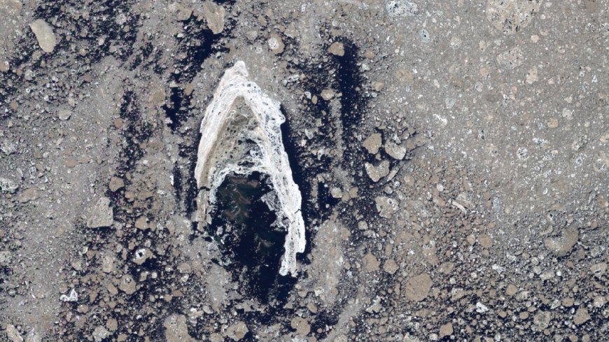 Earth from space: Iconic 'Star Trek' symbol shines brightly in sea of muddy Arctic sea ice --[Reported by Umva mag]