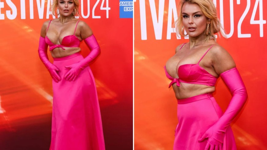 Tallia Storm leaves NOTHING to the imagination in tiny bra top and pink dress at Elton John movie premiere --[Reported by Umva mag]