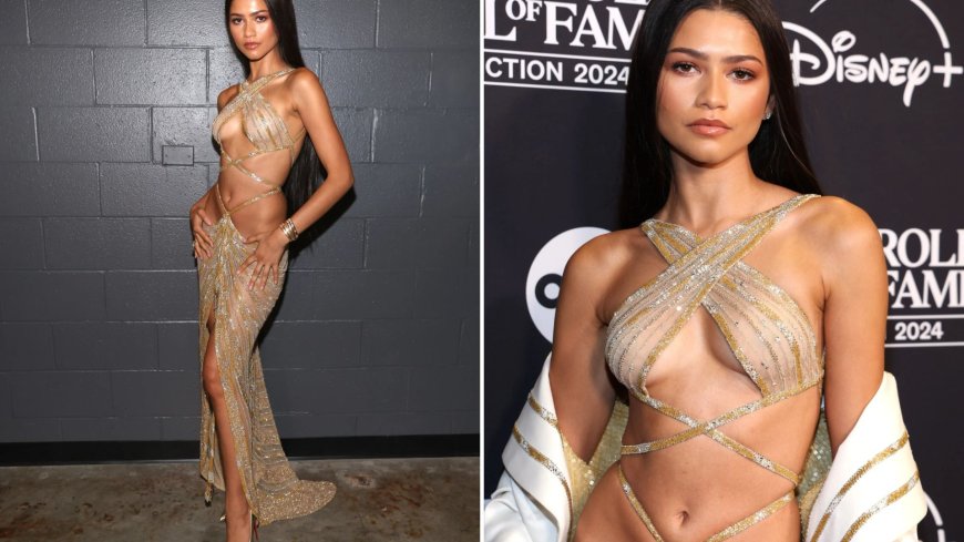 Zendaya reveals incredible figure in daring gold cut out dress as she channels Cher at Rock & Roll Hall of Fame --[Reported by Umva mag]